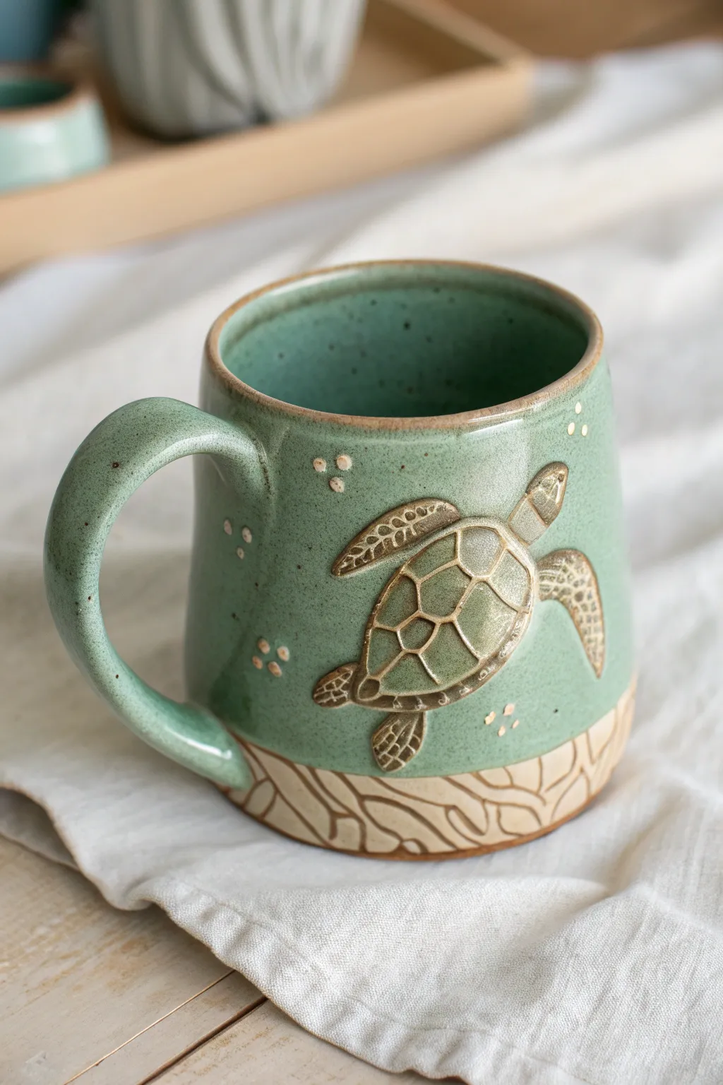 Sea turtle mug in ocean greens with a shell-textured belly and subtle flipper accents