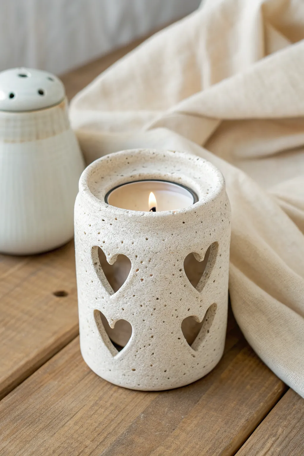 Heart cutout clay tea light lantern idea for cozy minimalist decor, easy and charming.