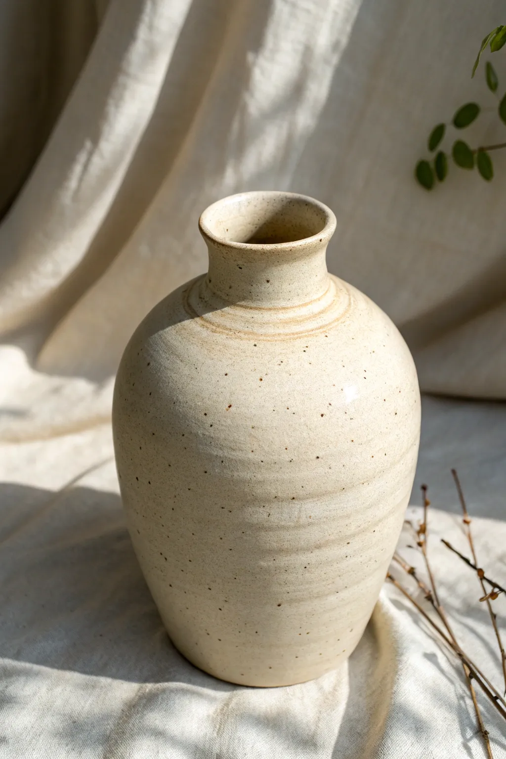 Altered oval vase from a cylinder, softly pinched and minimal for modern wheel ideas
