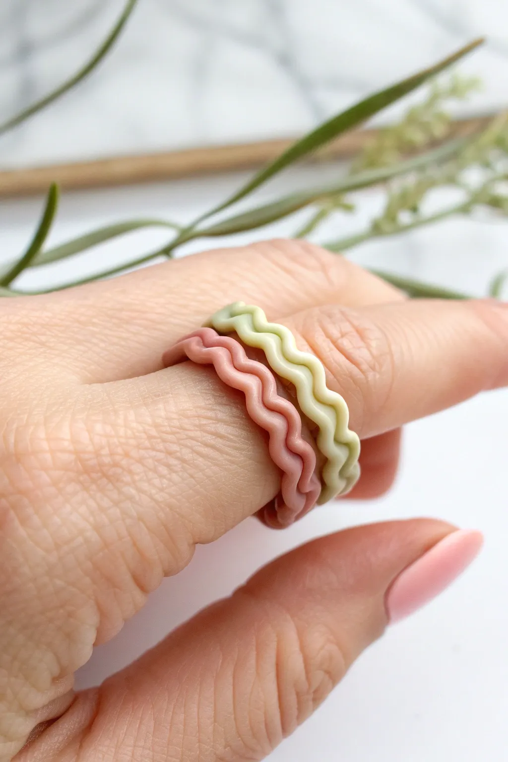 Three wavy clay stacking rings with glossy color pops for a sweet minimalist boho look.
