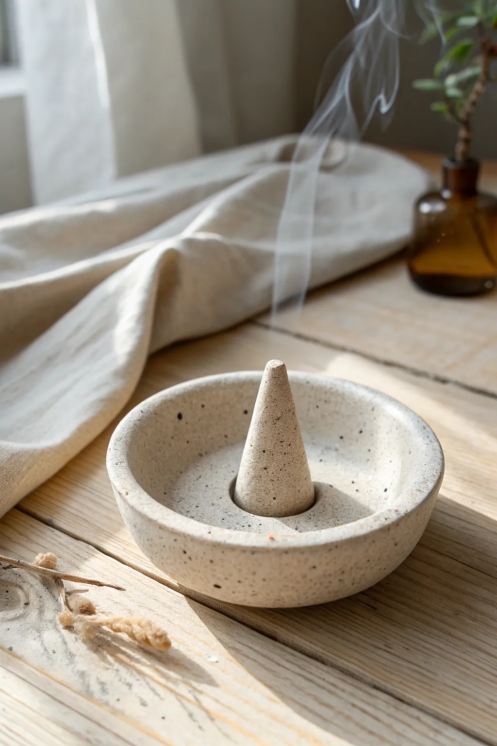 Minimal air dry clay incense cone burner bowl for a calm self-care ritual, simple and chic