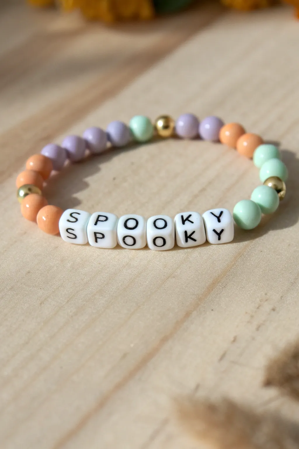 Pastel Halloween clay bead bracelet with SPOOKY letter beads, minimalist and boho chic