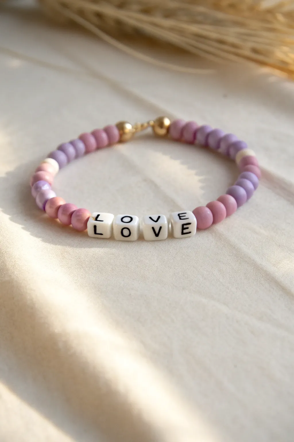 Pink and purple clay bead bracelet with a sweet alphabet center, minimal boho charm