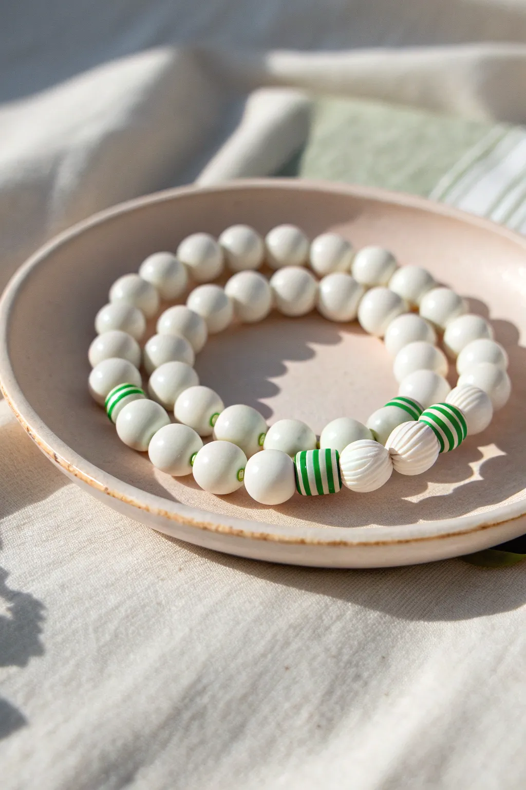 Tennis white clay bead stack with a crisp green stripe for a clean preppy summer look
