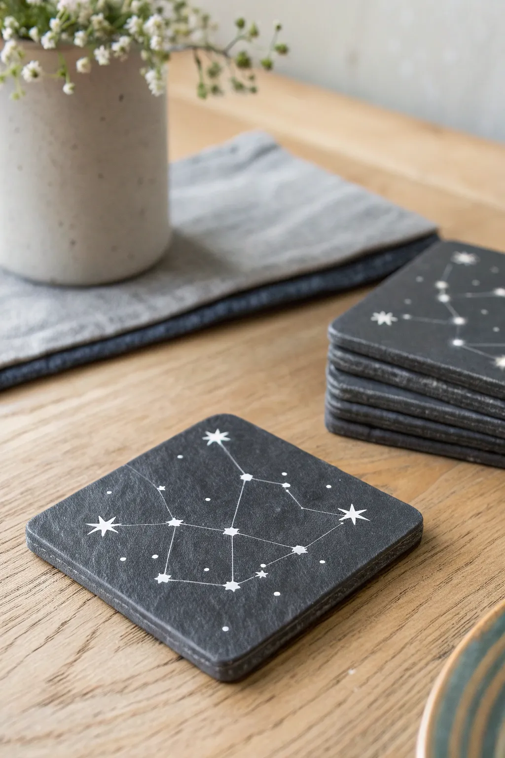 Dark clay constellation tile coasters that add a calm night sky vibe to your table, simple DIY.