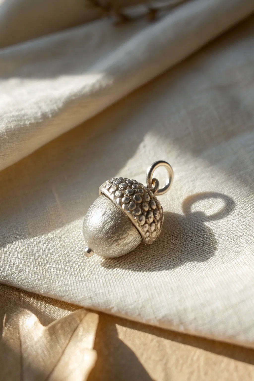Beginner-friendly silver clay acorn cap pendant with a simple loop and beautiful texture