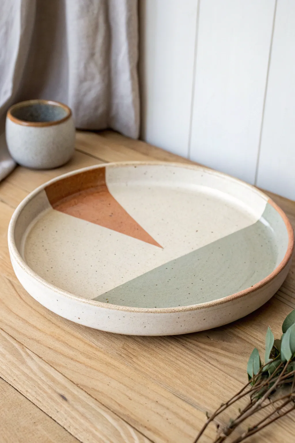 Minimal color block ceramic platter with geometric shapes, Scandi calm with a boho twist.