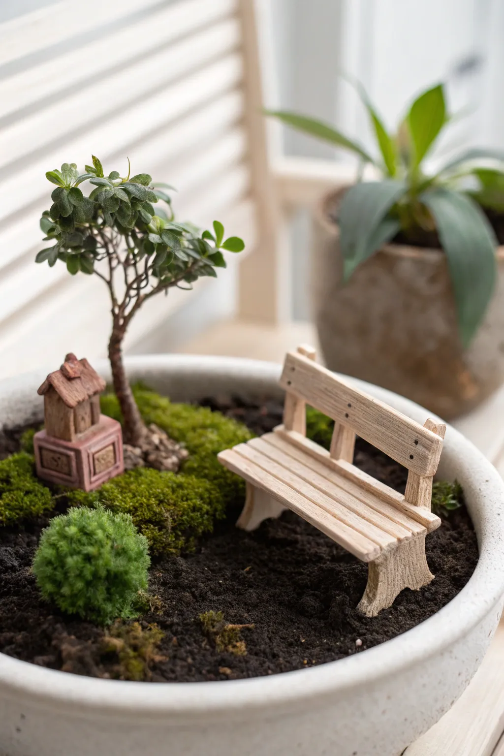 Mini clay bench under a tiny tree brings a peaceful park moment to any planter garden.