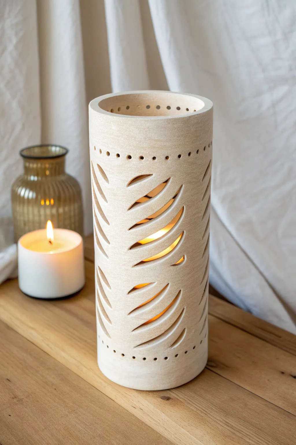Spiral wrap slab lantern glowing softly, minimalist clay craft with warm, boho Scandinavian charm