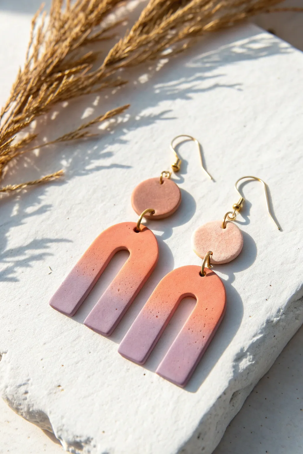 Sunset gradient polymer clay earrings with clean cutouts, minimalist boho style for Pinterest.
