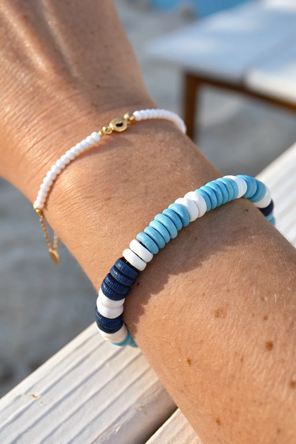Blue-and-white heishi waves bring preppy beach energy to an easy handmade clay bead bracelet.