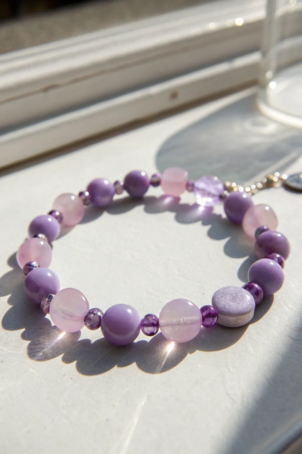 Translucent jelly purple clay beads with lilac disc accents for a soft, modern bracelet