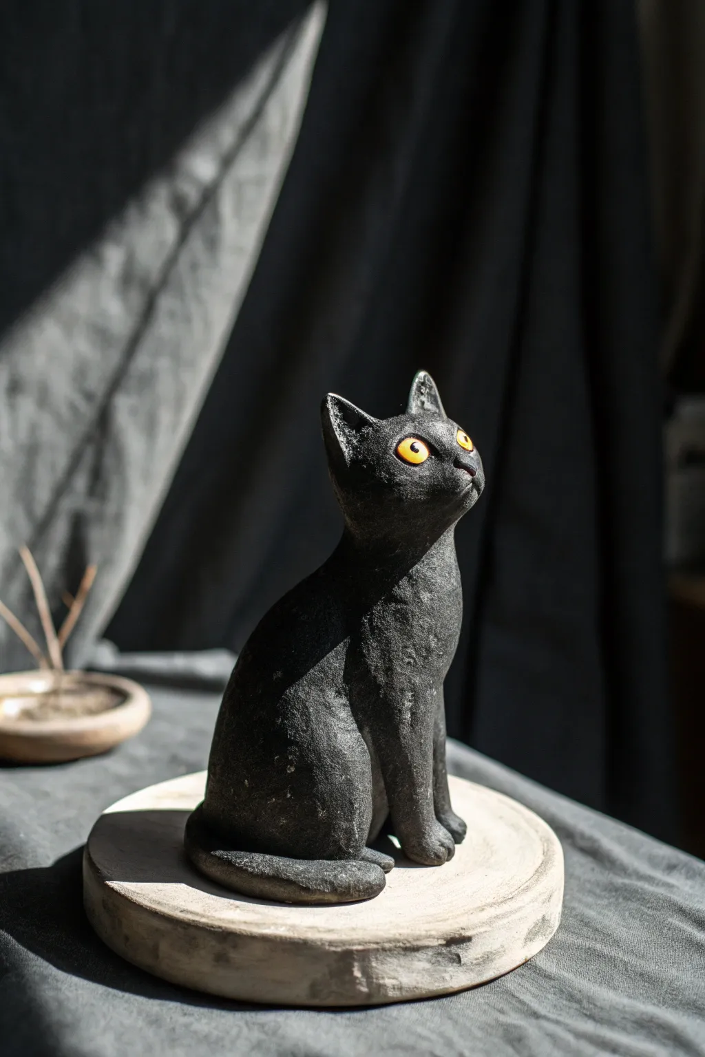 Cursed black clay cat with glowing eyes, minimalist and eerie, perfect for spooky décor.