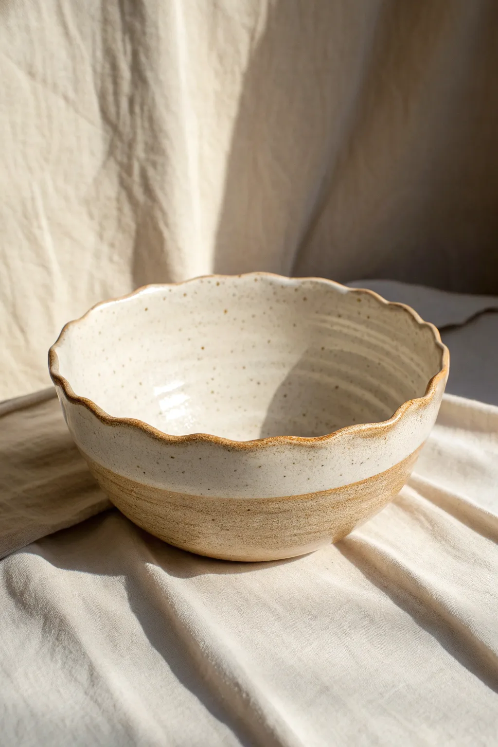 A minimalist wavy rim bowl that highlights thrown pottery curves and handmade charm.
