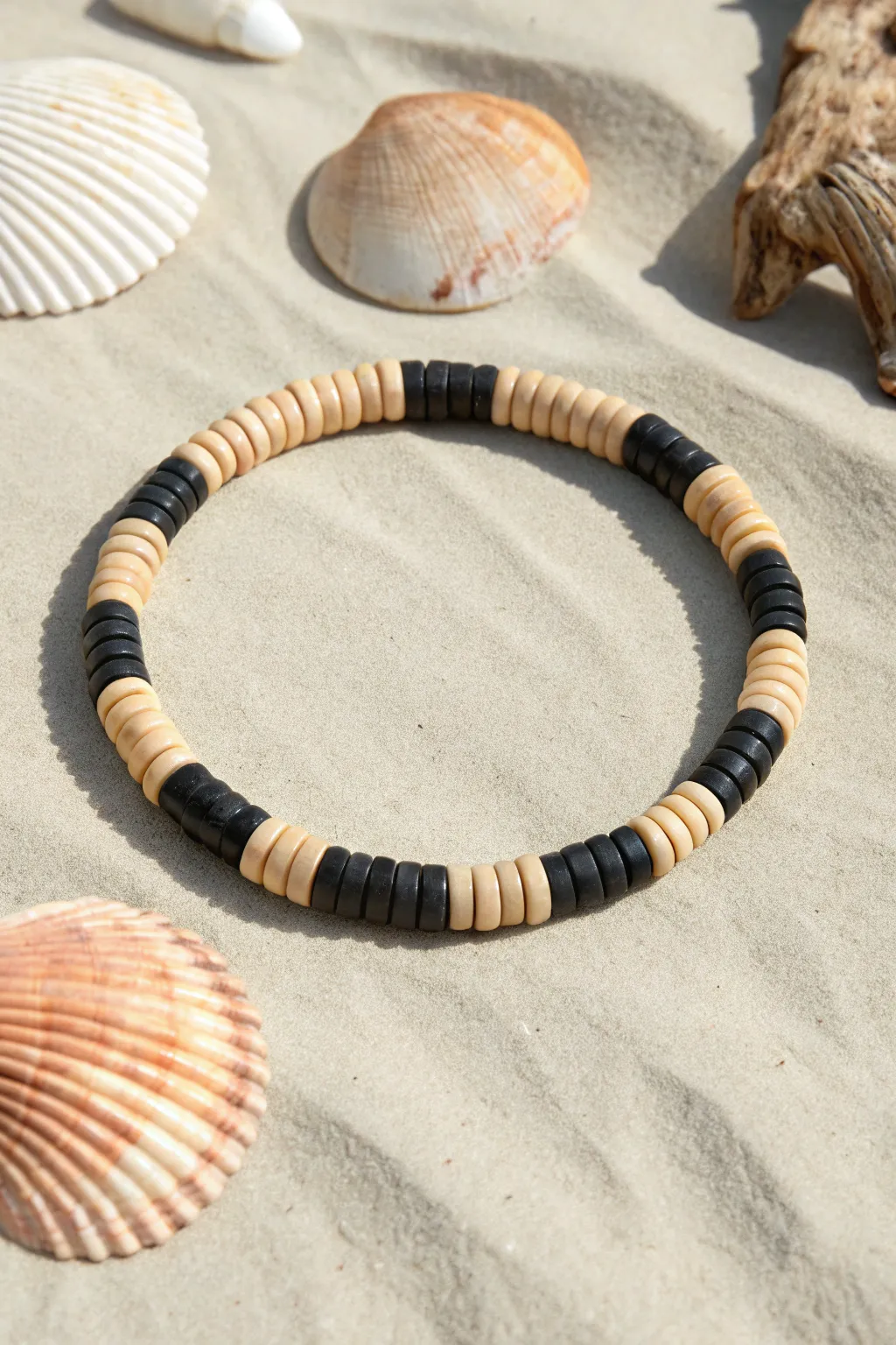 Checkerboard heishi bracelet in black and cream, minimalist and bold for Pinterest style.
