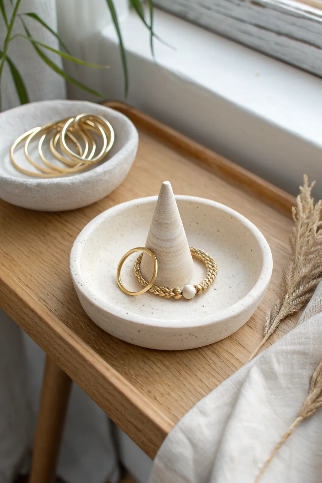 Minimal air dry clay ring cone trinket dish idea with soft boho styling and natural light.