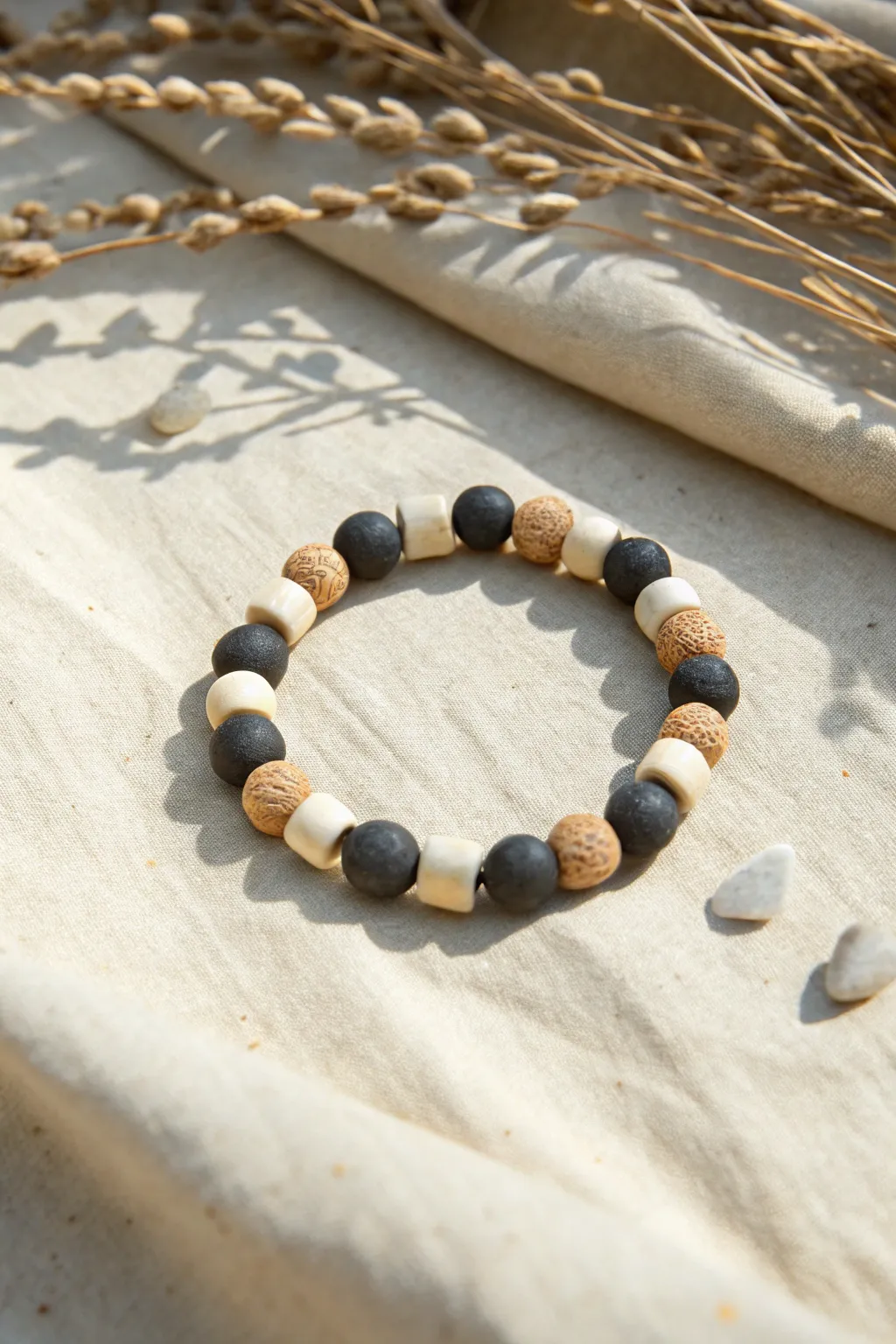 Bold checkerboard clay bead bracelet in two-tone neutrals for an easy, modern statement.