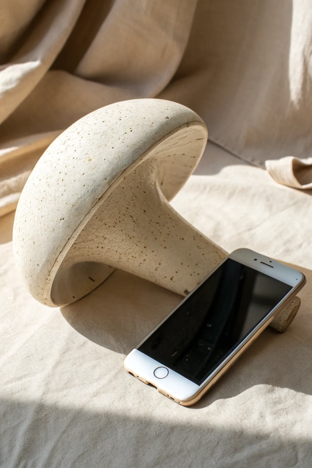 A sweet ceramic mushroom megaphone that amplifies your phone naturally with minimalist charm
