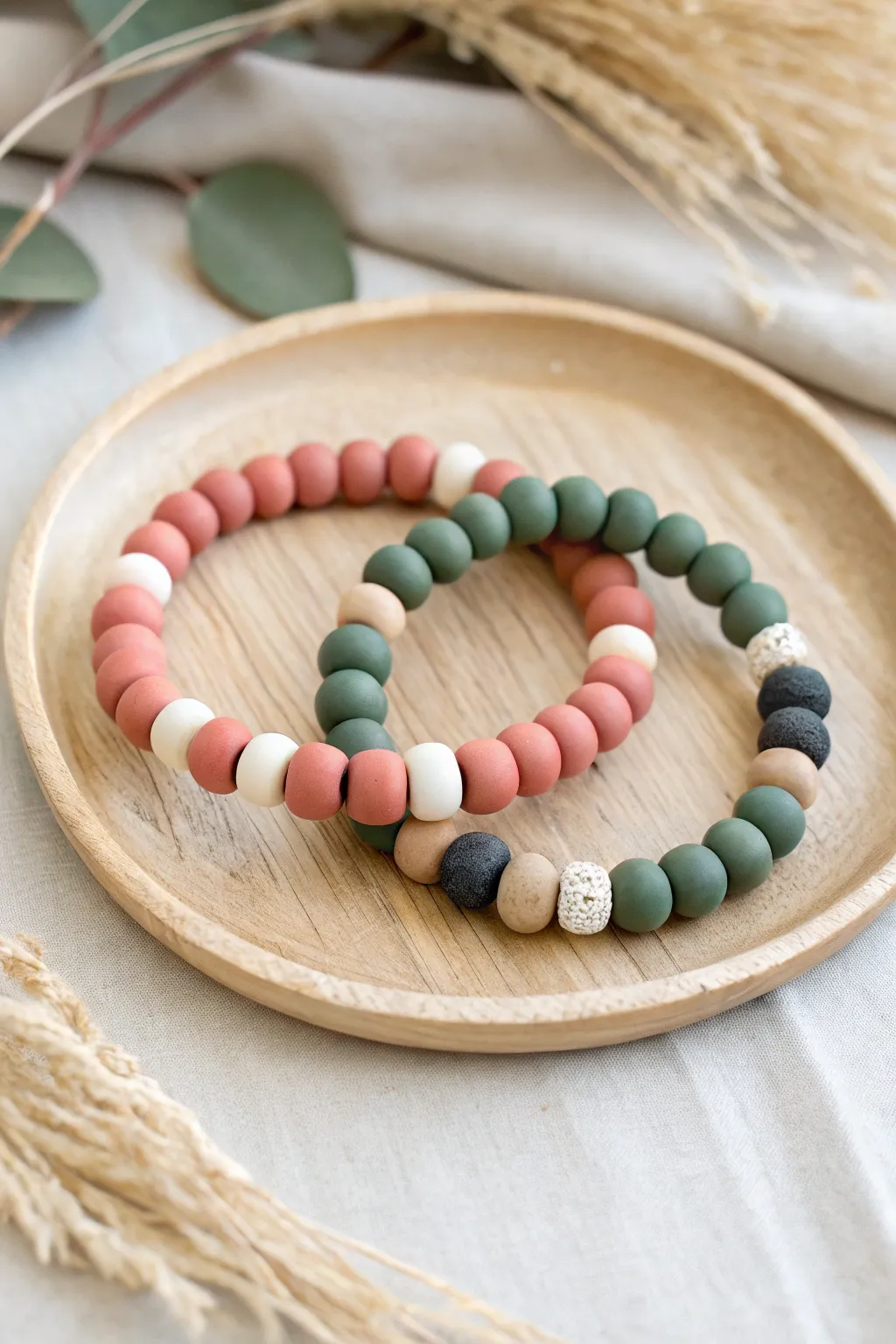 Color-blocked clay bead bracelet pair with swapped sequences, minimalist yet warm and romantic.