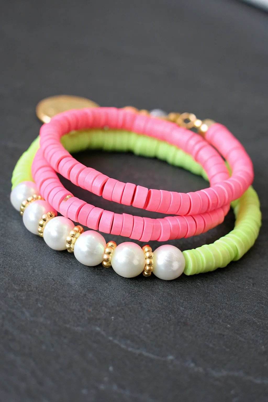Neon and luminous clay bead stack for a subtle night glow, minimalist and boho-ready