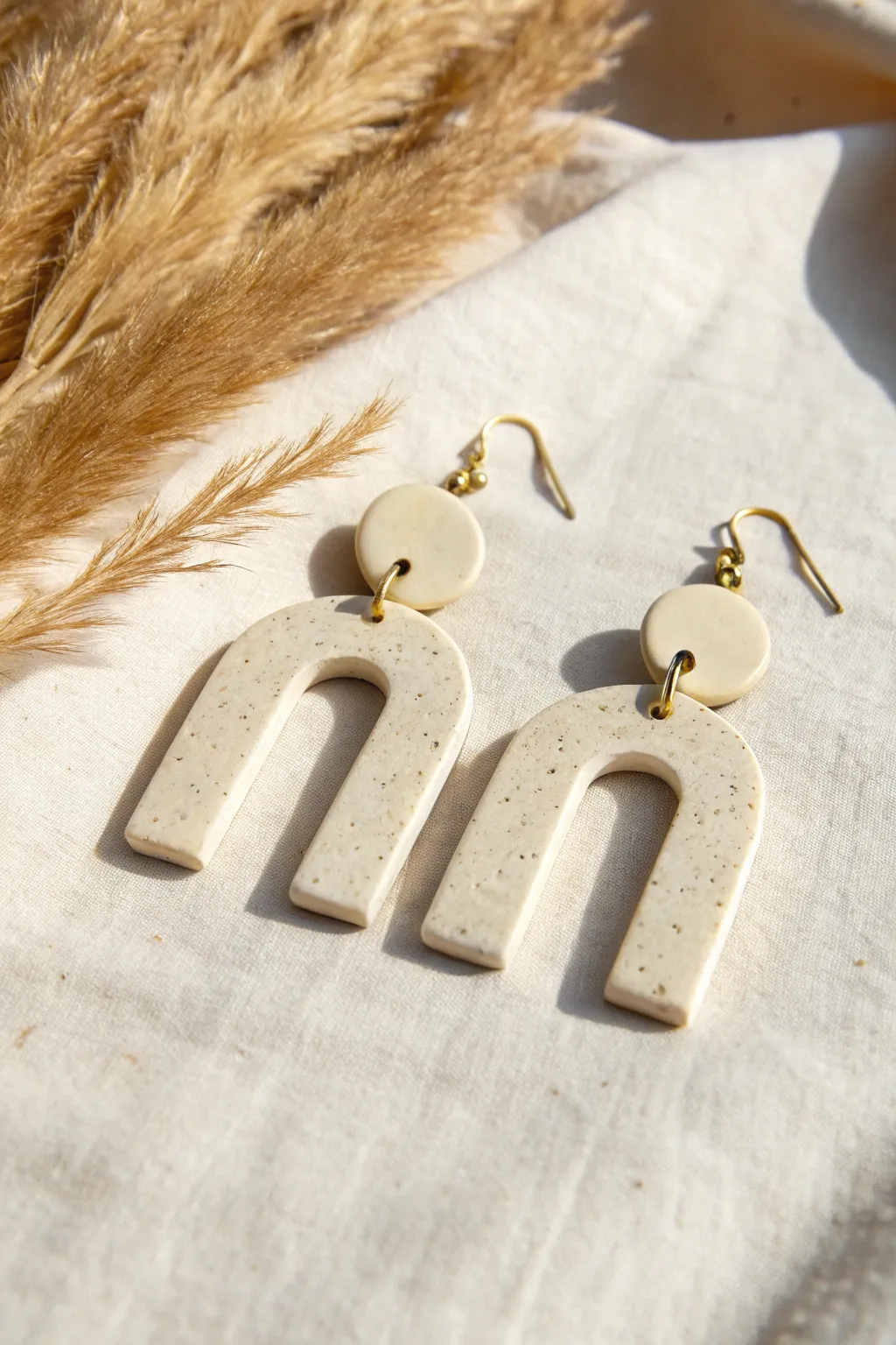 Beginner-friendly clay earrings with elegant negative-space cutouts and a calm minimalist look