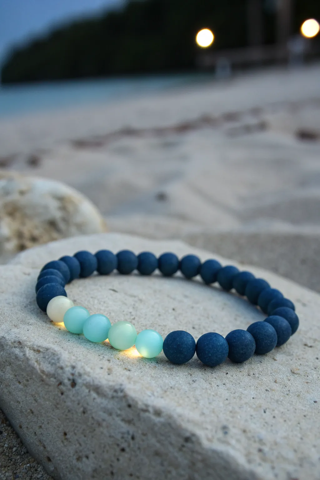 Deep ocean blues meet a soft nighttime glow for the cutest sea sparkle clay bead bracelet.