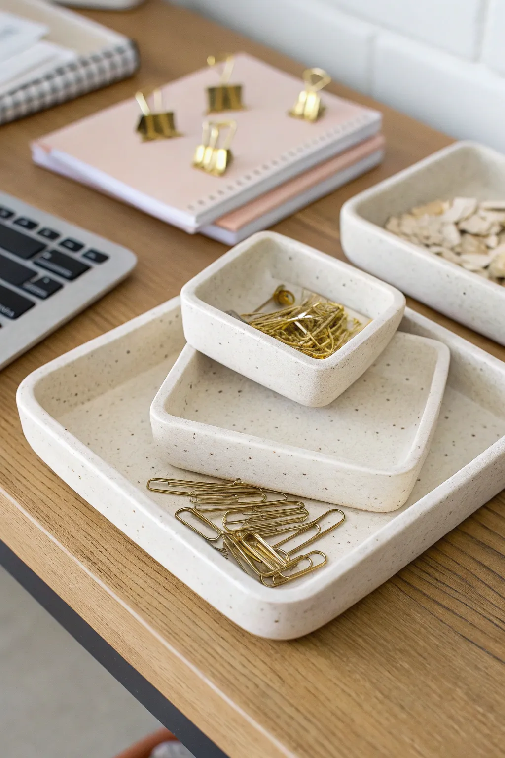 Stackable handmade clay catchall trays that keep desk essentials tidy in minimalist boho style.