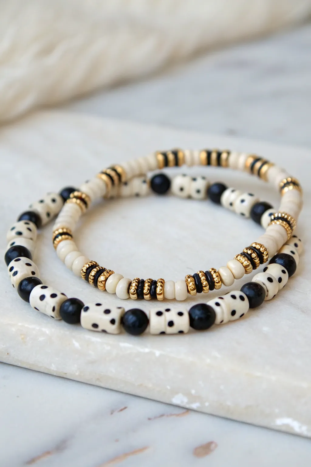 Matching Morse code clay bead duo in black and ivory, minimalist boho secret message set.