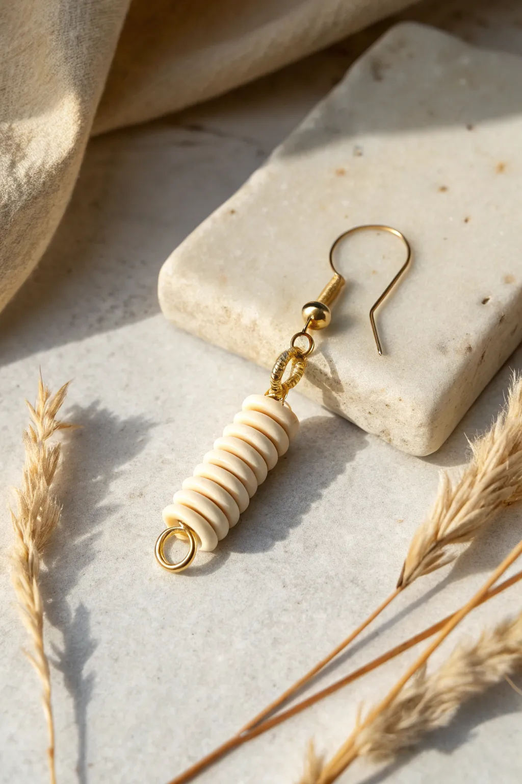 Tiny spring coils from extruded polymer clay make a minimalist, boho-chic earring focal detail