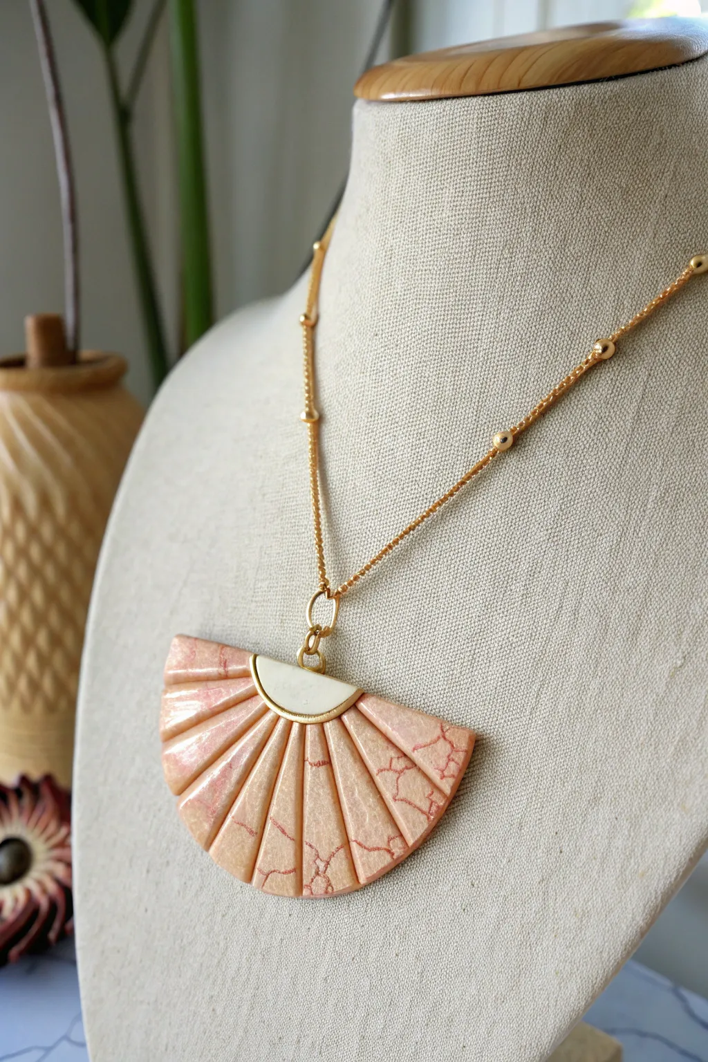 Crackle veneer fan pendant necklace with soft light and minimalist Scandinavian styling