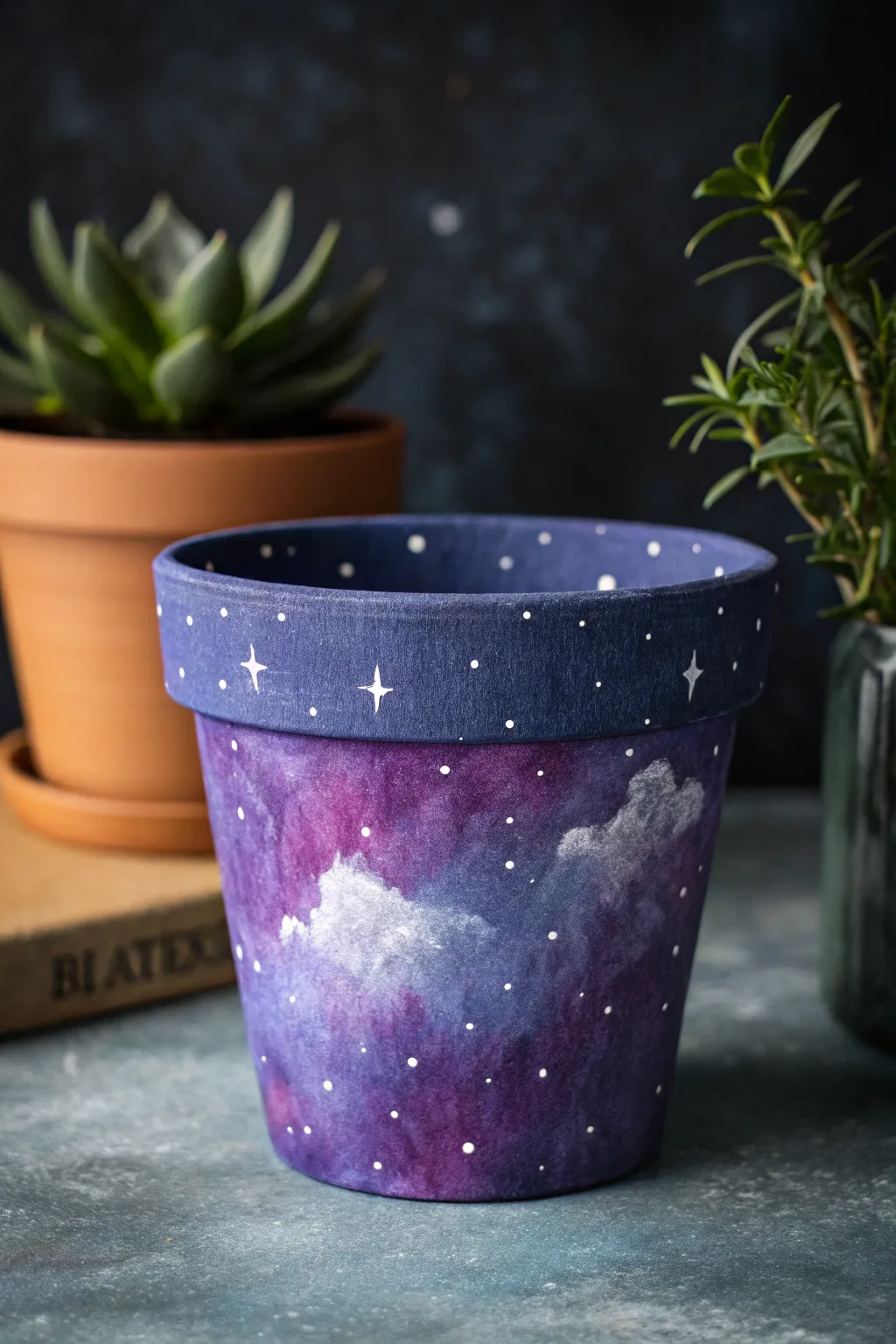 Night-sky galaxy speckle pot in deep blues and purples, styled moody for high contrast.