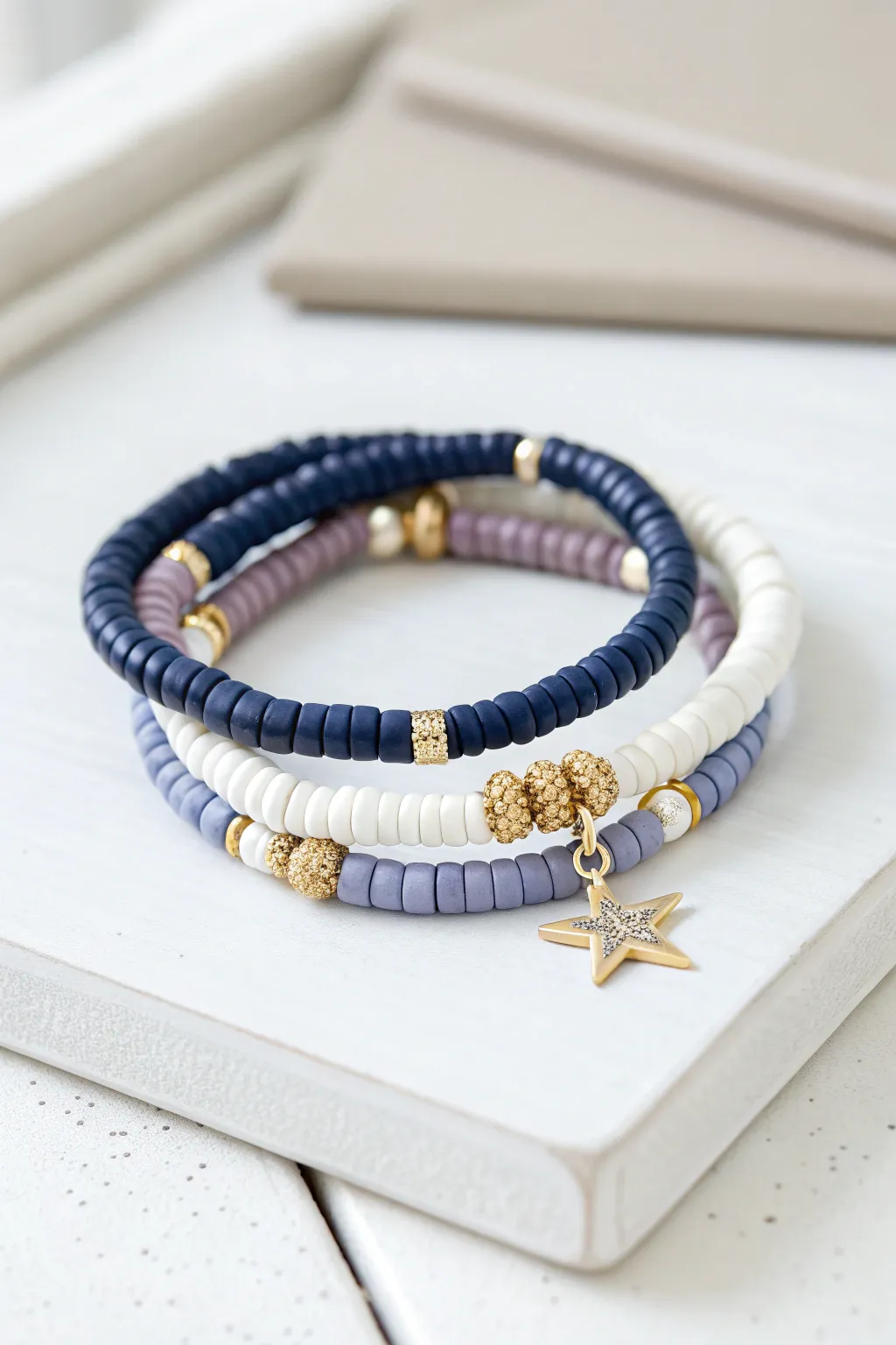 Starry night preppy bracelet stack in blue, lavender, and white with tiny star accents