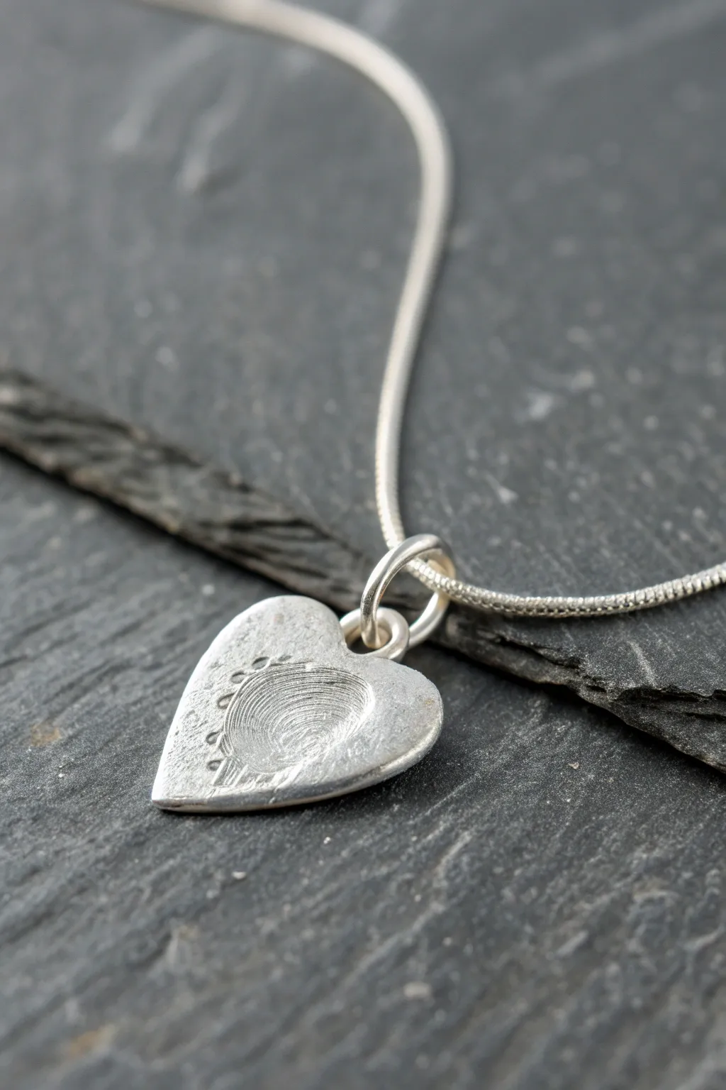 Fingerprint heart silver clay charm necklace, minimal and modern with a soft sentimental shine