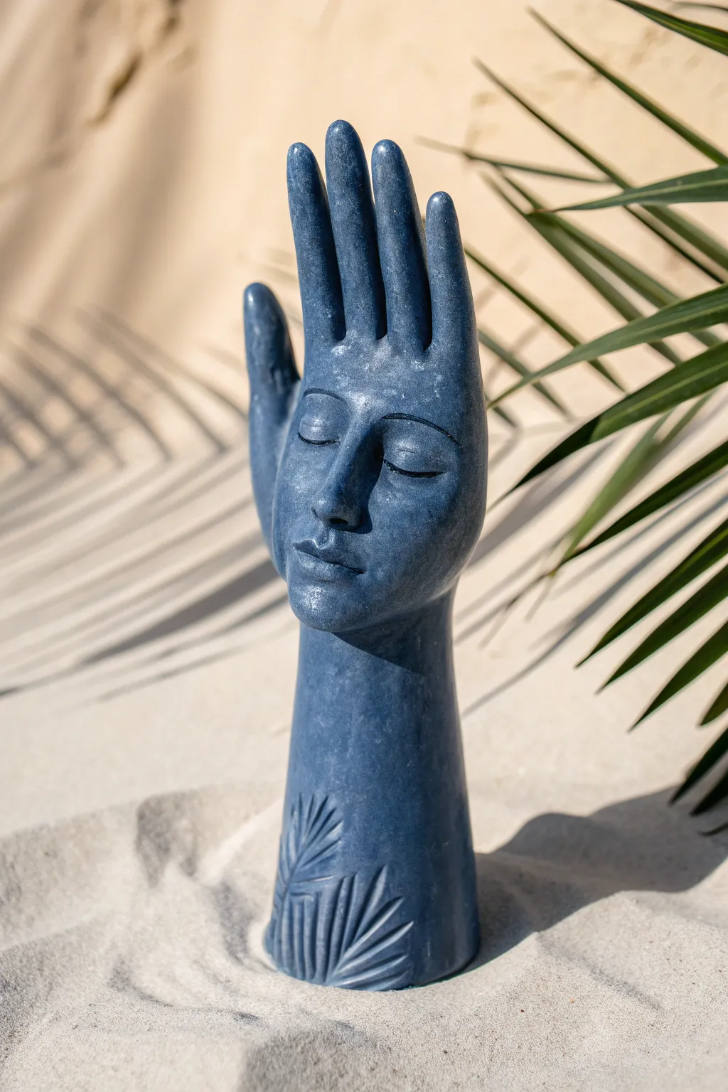 Surreal hand meets melting face in a single bold hue, minimalist yet dreamy clay art.