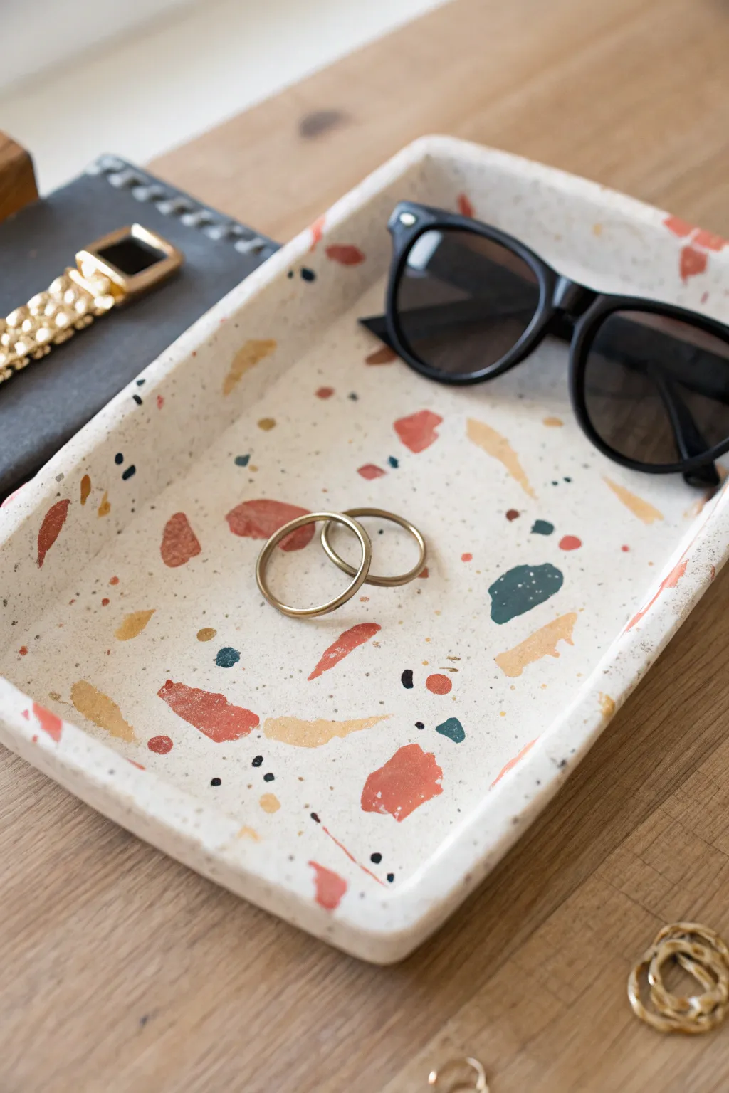 Terrazzo air dry clay catchall tray that keeps everyday essentials in bold, minimalist style.
