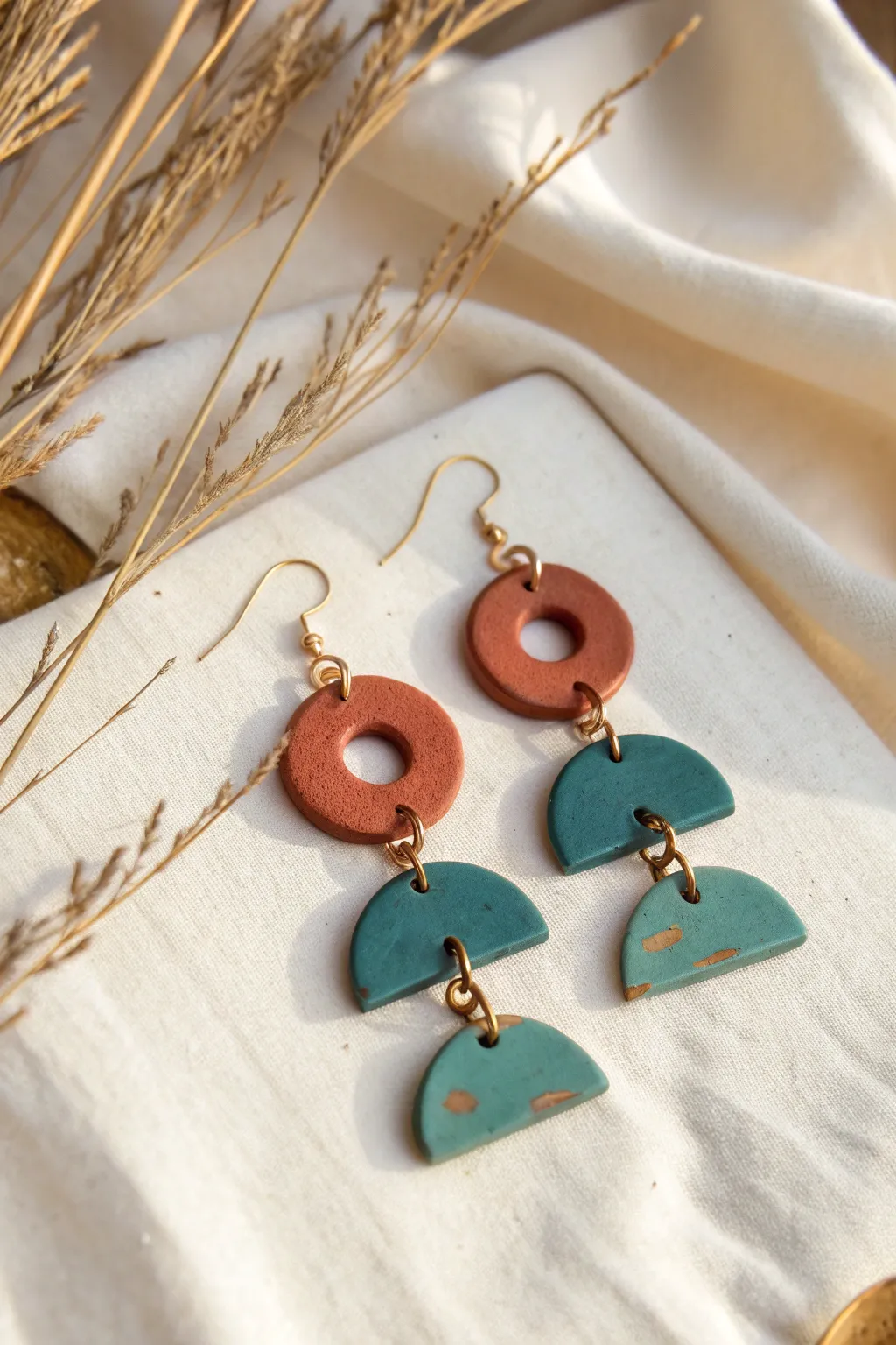 Kinetic air dry clay link earrings in terracotta and teal, modern minimal with boho charm