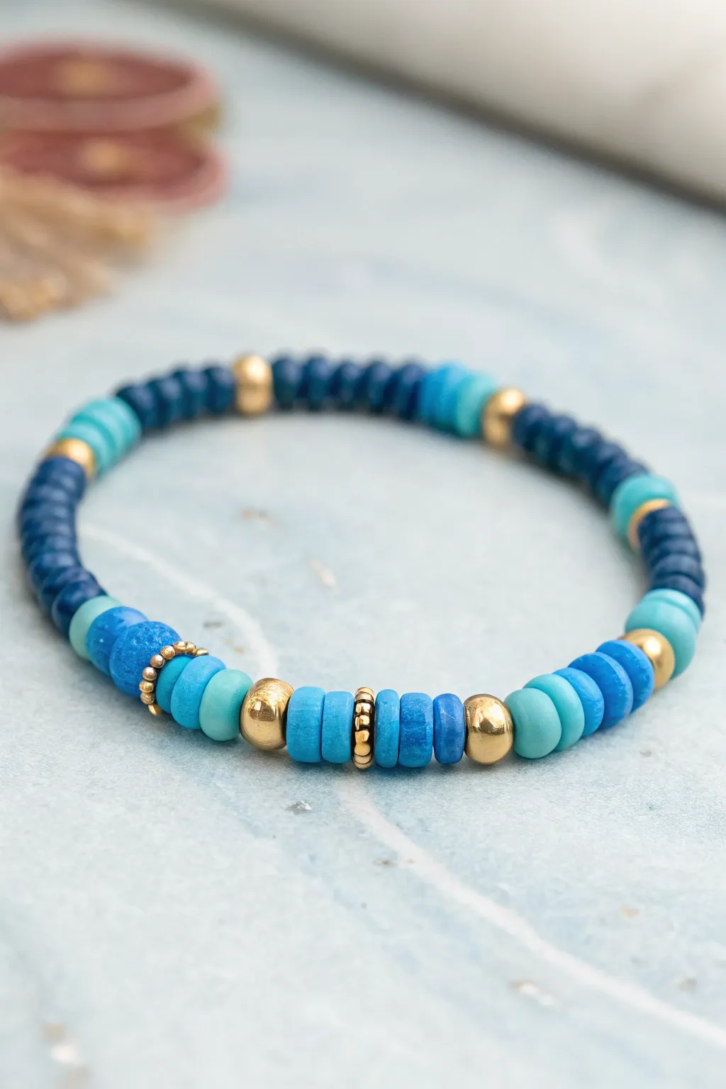 Mixed blue heishi bracelet with round and tube accents, simple, wearable, Blue Haven calm.