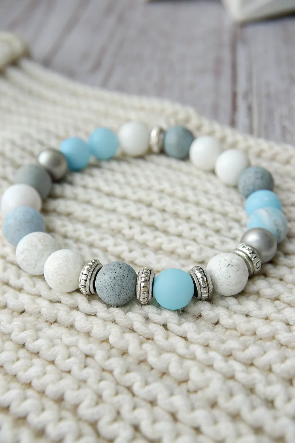 Winter icy clay bead bracelet with silver spacers and frosty blues, minimal yet sellable