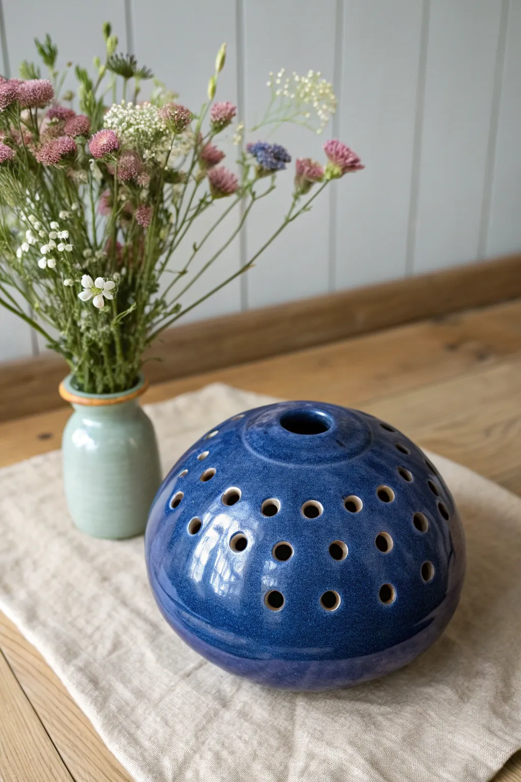 Bold cobalt clay flower frog for effortless, tidy bouquets in a calm Scandinavian boho home.