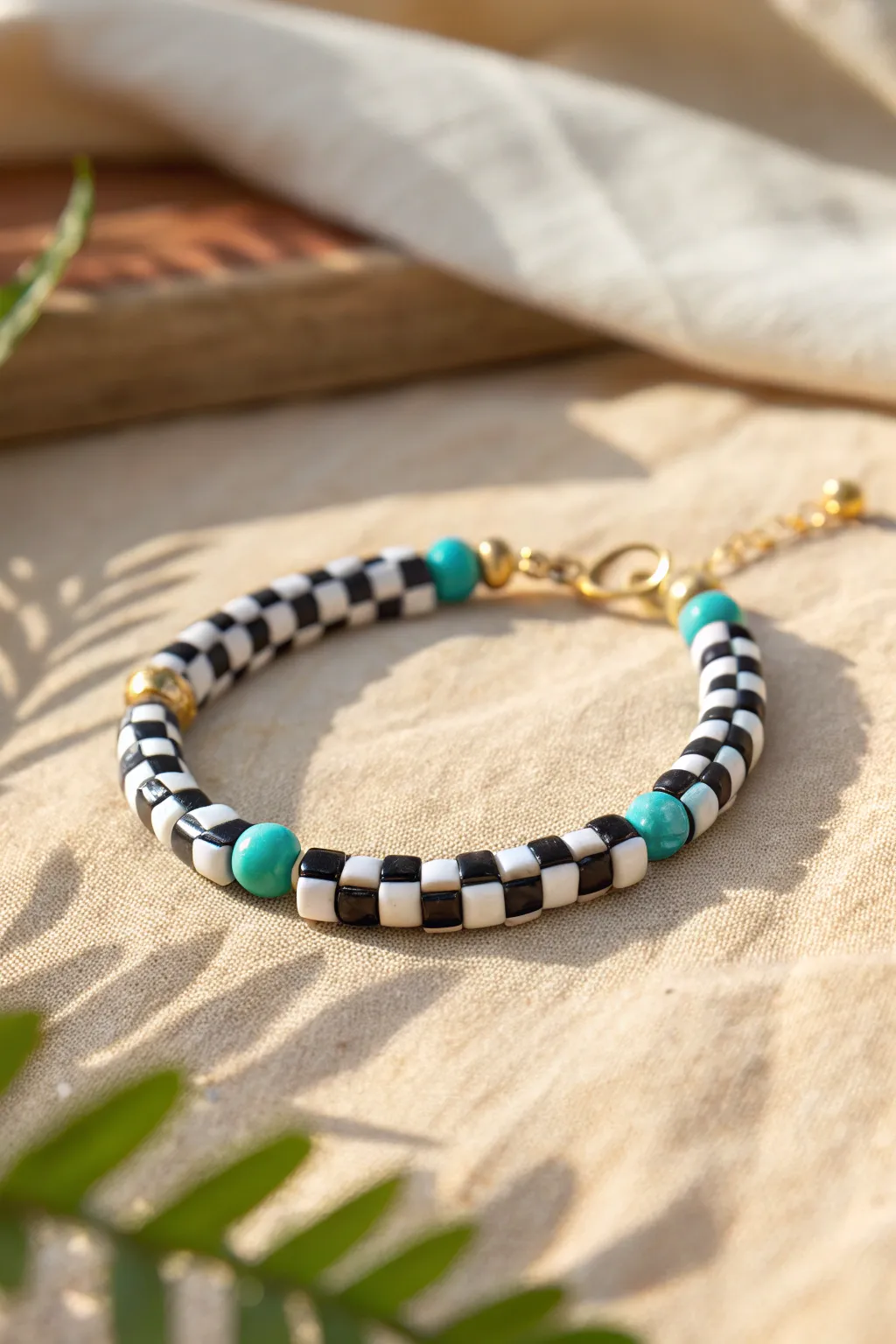 Mini checkerboard clay bead bracelet with turquoise spacers for an easy cowgirl-cute pop