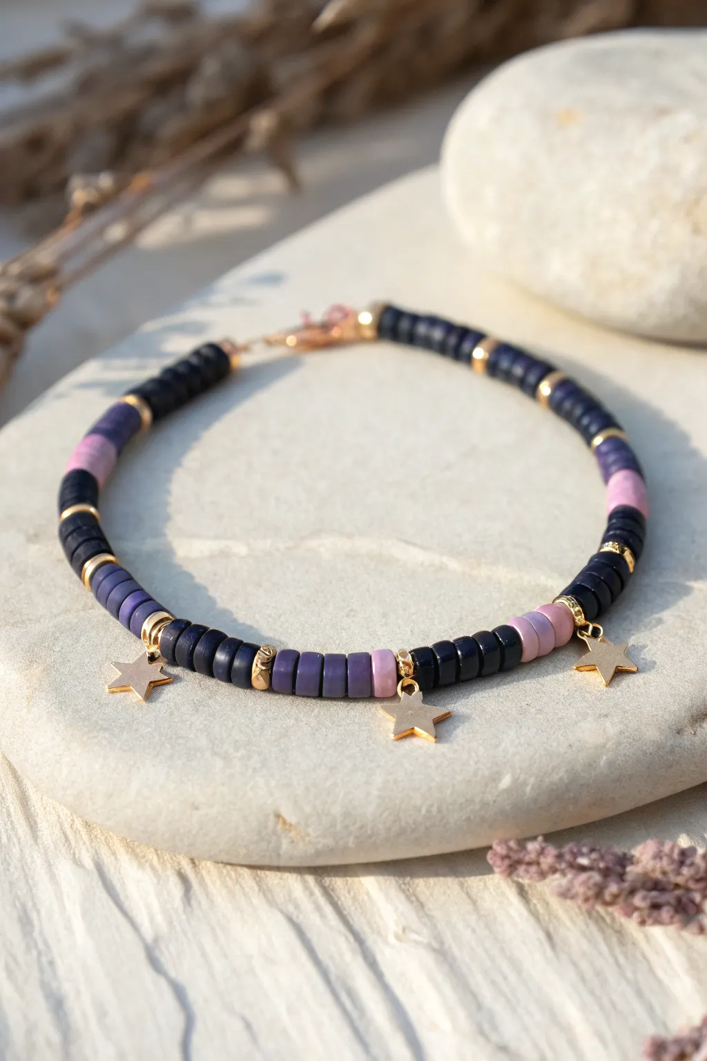 Night Sky Glow Mix bracelet: navy, black and lavender heishi beads with tiny star accents.