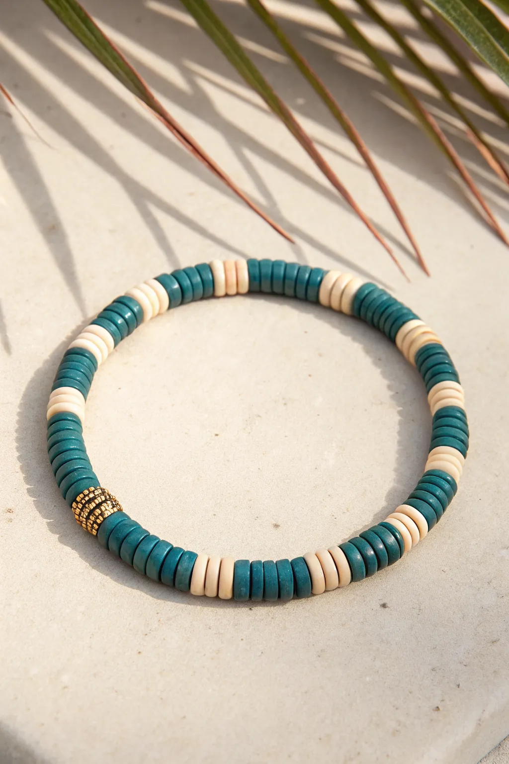 Simple two-tone heishi bracelet with a steady checkerboard rhythm, bold color, minimal style