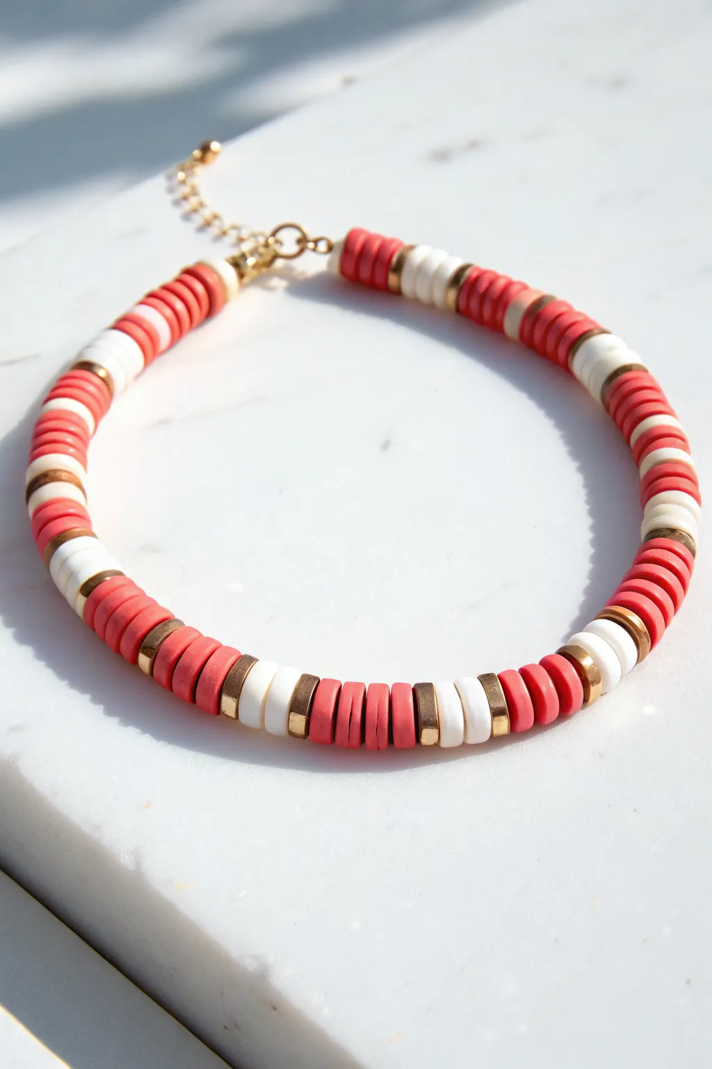 Bold two-color heishi disc bracelet in a crisp checkerboard rhythm, minimalist and boho-chic.