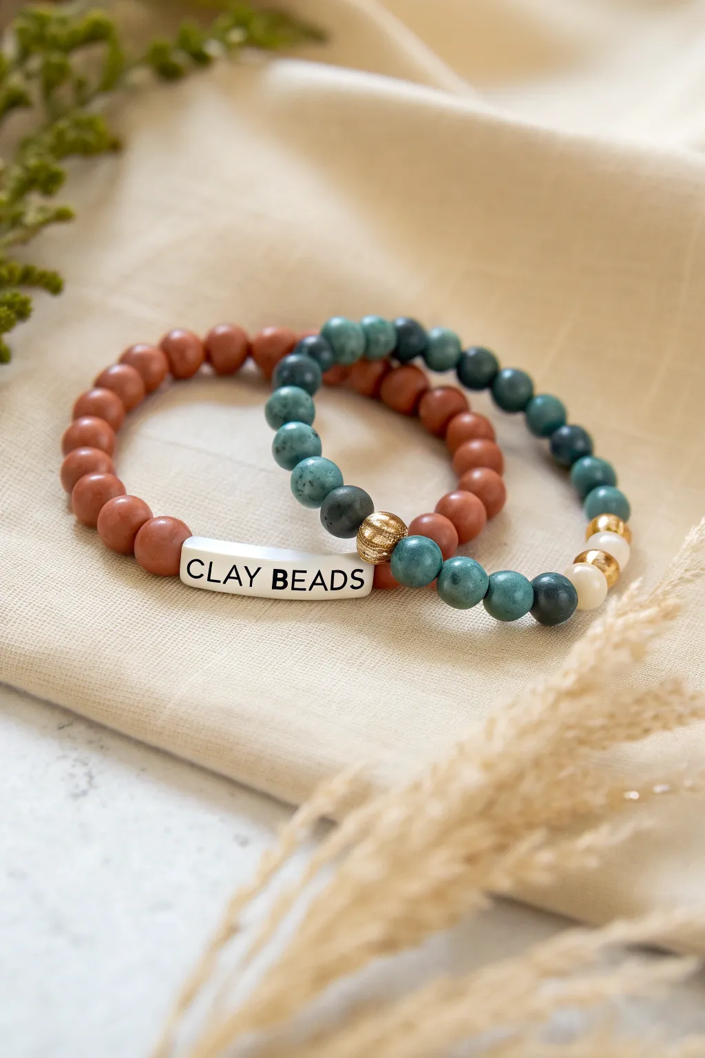 Matching clay bead bracelets with date number beads and gold spacers, boho minimal vibes.