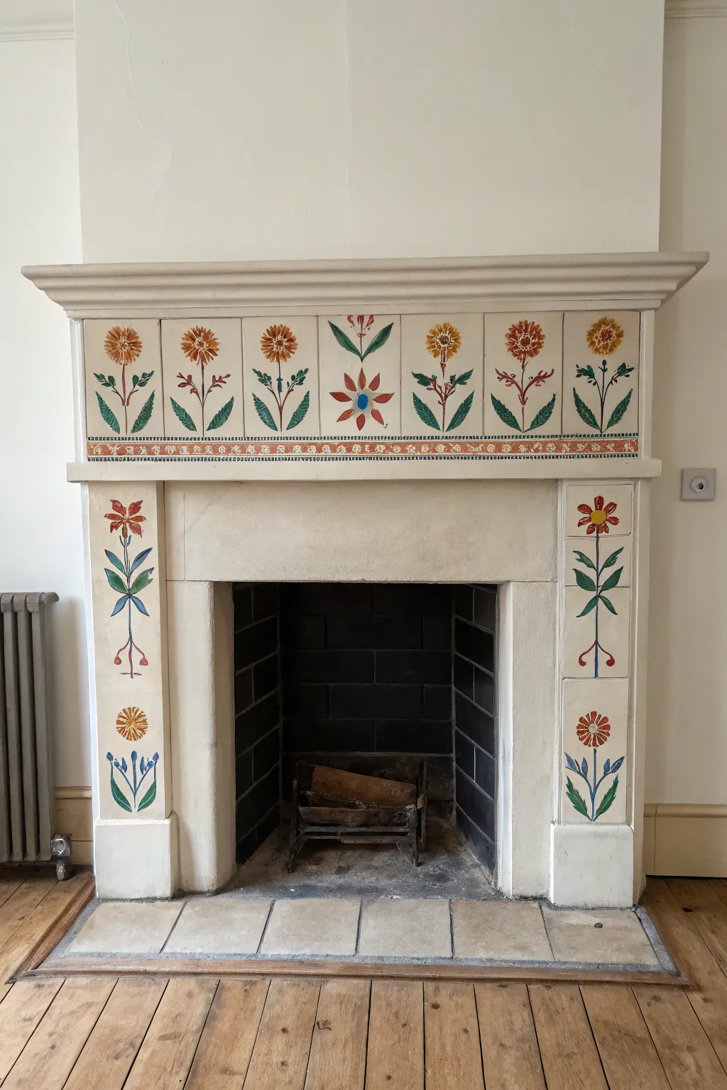 Neutral fireplace with a bold hand-painted folk art tile strip for an easy statement look