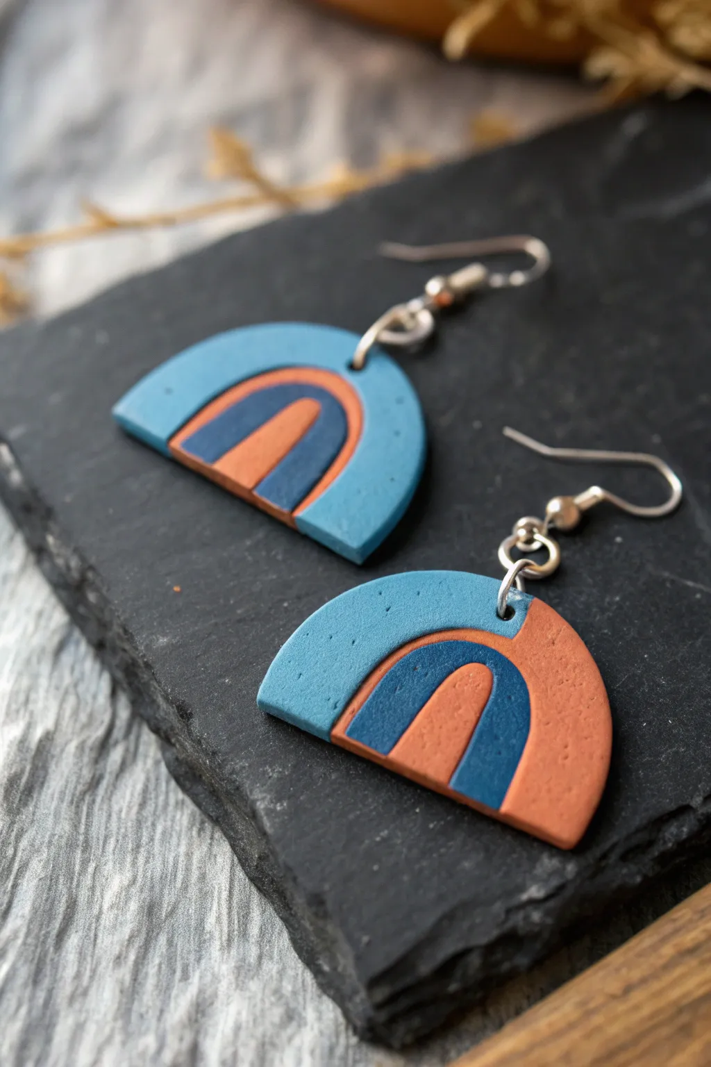 High-contrast negative-space inlay slab earring with crisp swapped colors and minimalist boho flair.
