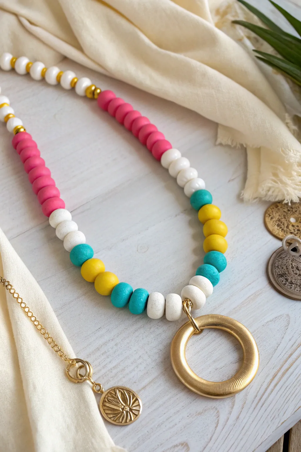 Swap-out big loop centerpiece: one necklace, three preppy charm looks on soft linen