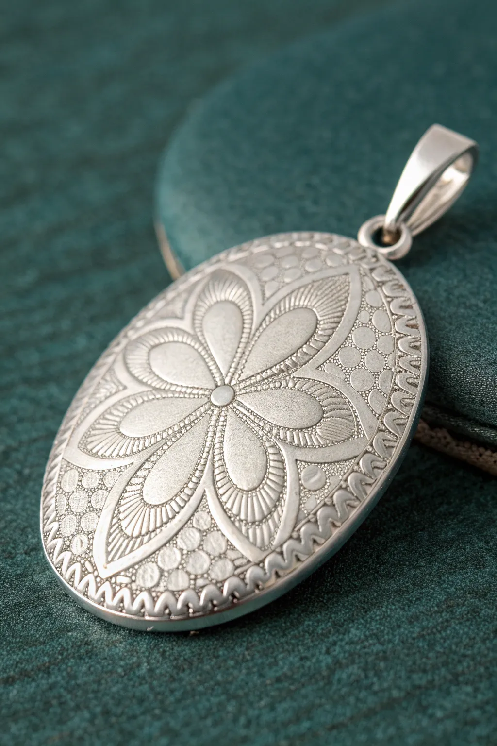 Airy syringe-drawn lace silver clay pendant, crisp contrast on a dark minimalist backdrop.