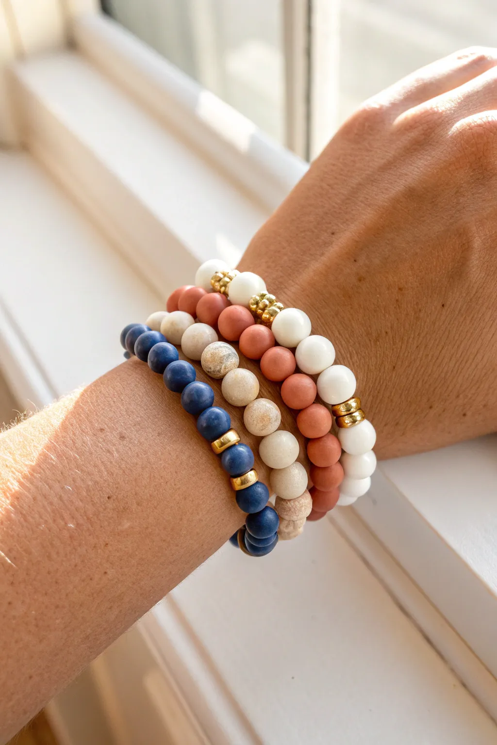 Easy clay bead bracelet stack: solid, color-block, and spacer styles in one cohesive palette.