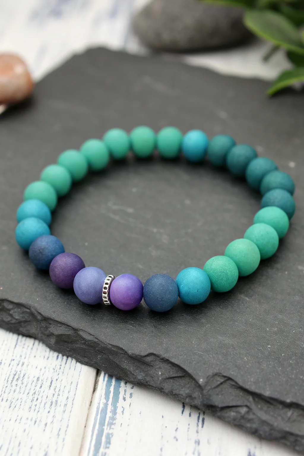 Aurora gradient clay bead bracelet in winter tones, minimal and magical for cozy outfits